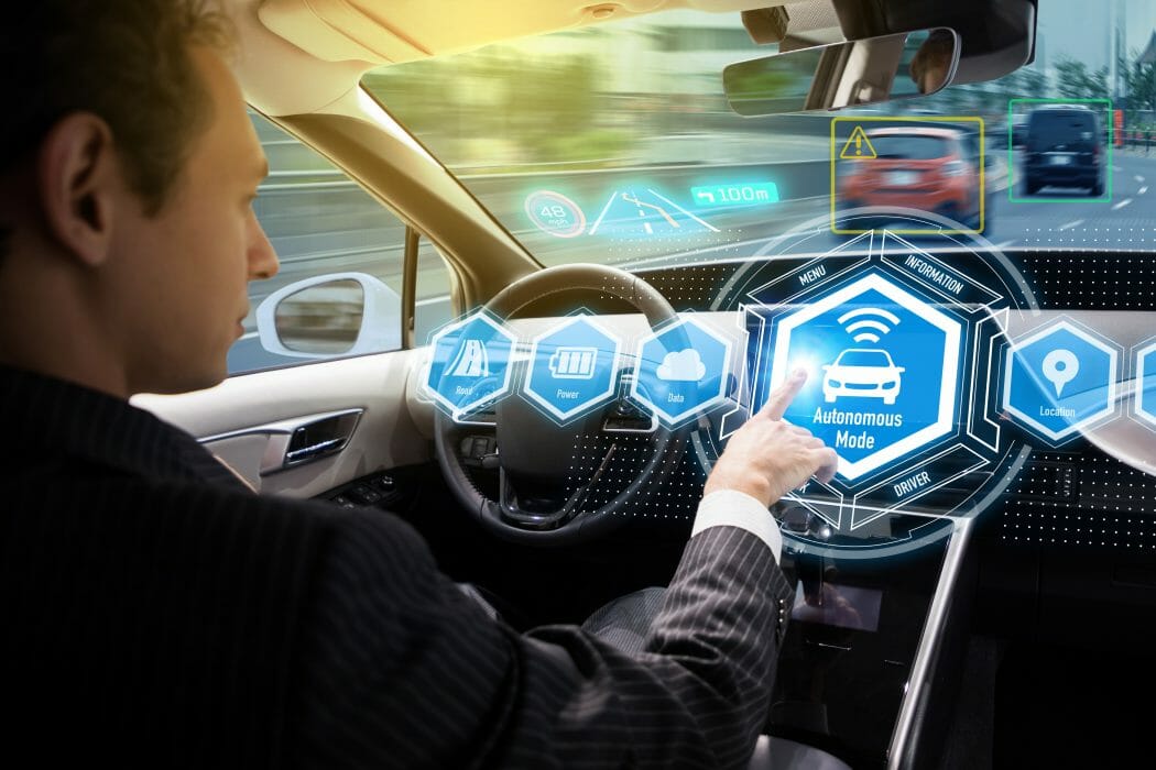 How to invest here and now in the driverless car future