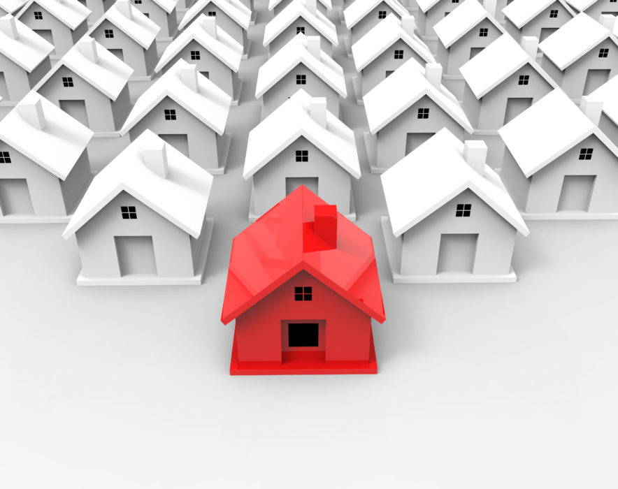 Is it better to buy an investment property or home first?